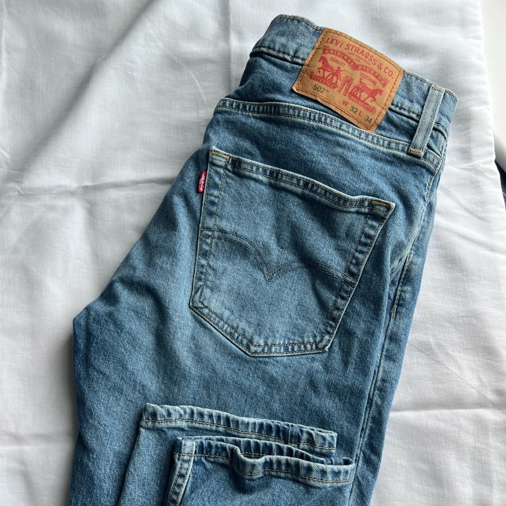 MENS 502 athletic taper jeans size 32/34